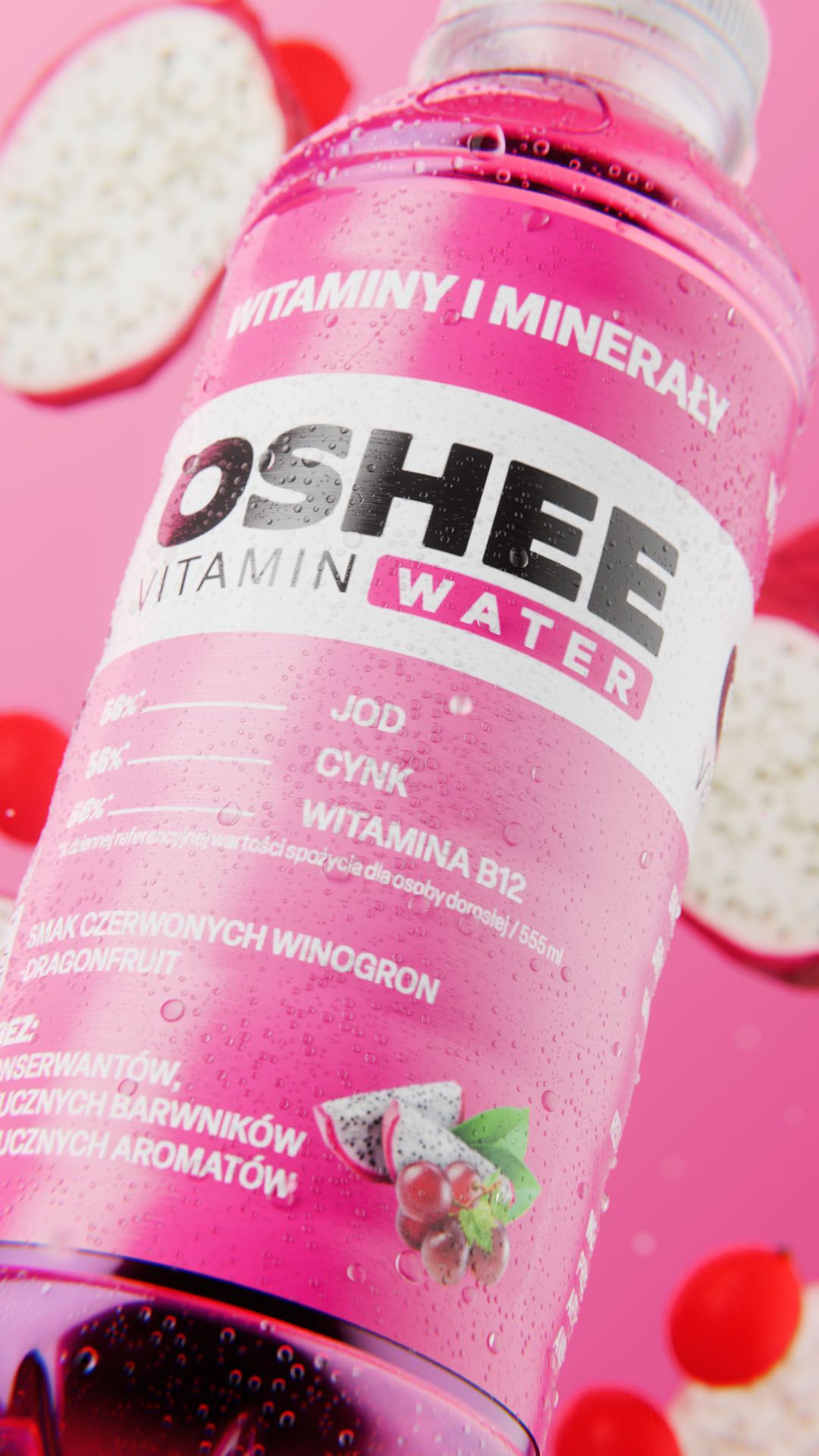 Extreme close-up of the OSHEE Vitamin Water bottle label in red grape and dragon fruit flavour, beaded with condensation, with halved dragon fruit floating behind it on pink, vertical 3D CGI product render