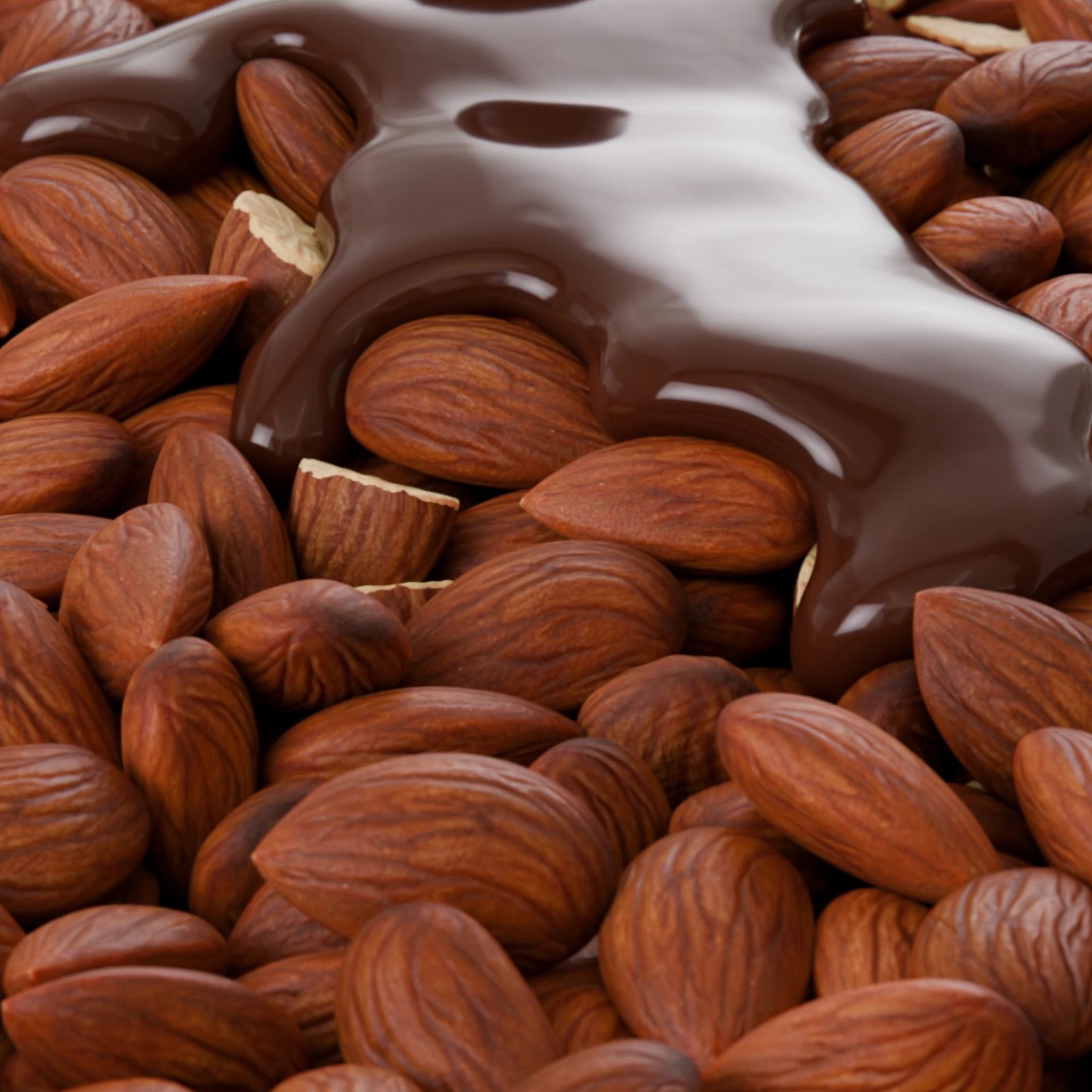 Macro close-up of melted chocolate flowing over a bed of whole roasted almonds, 3D CGI render