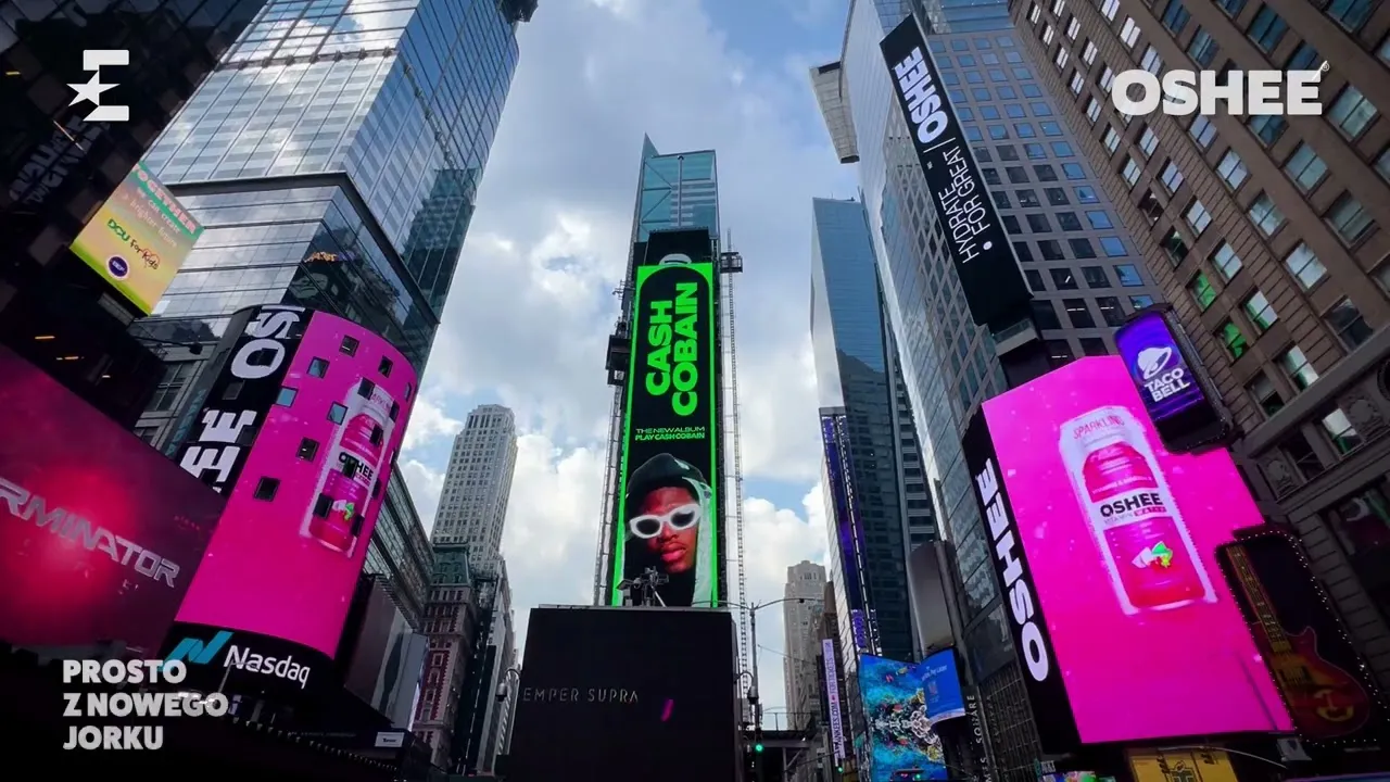 OSHEE Sparkling Water billboards lighting up Times Square, New York, among the neon screens and skyscrapers