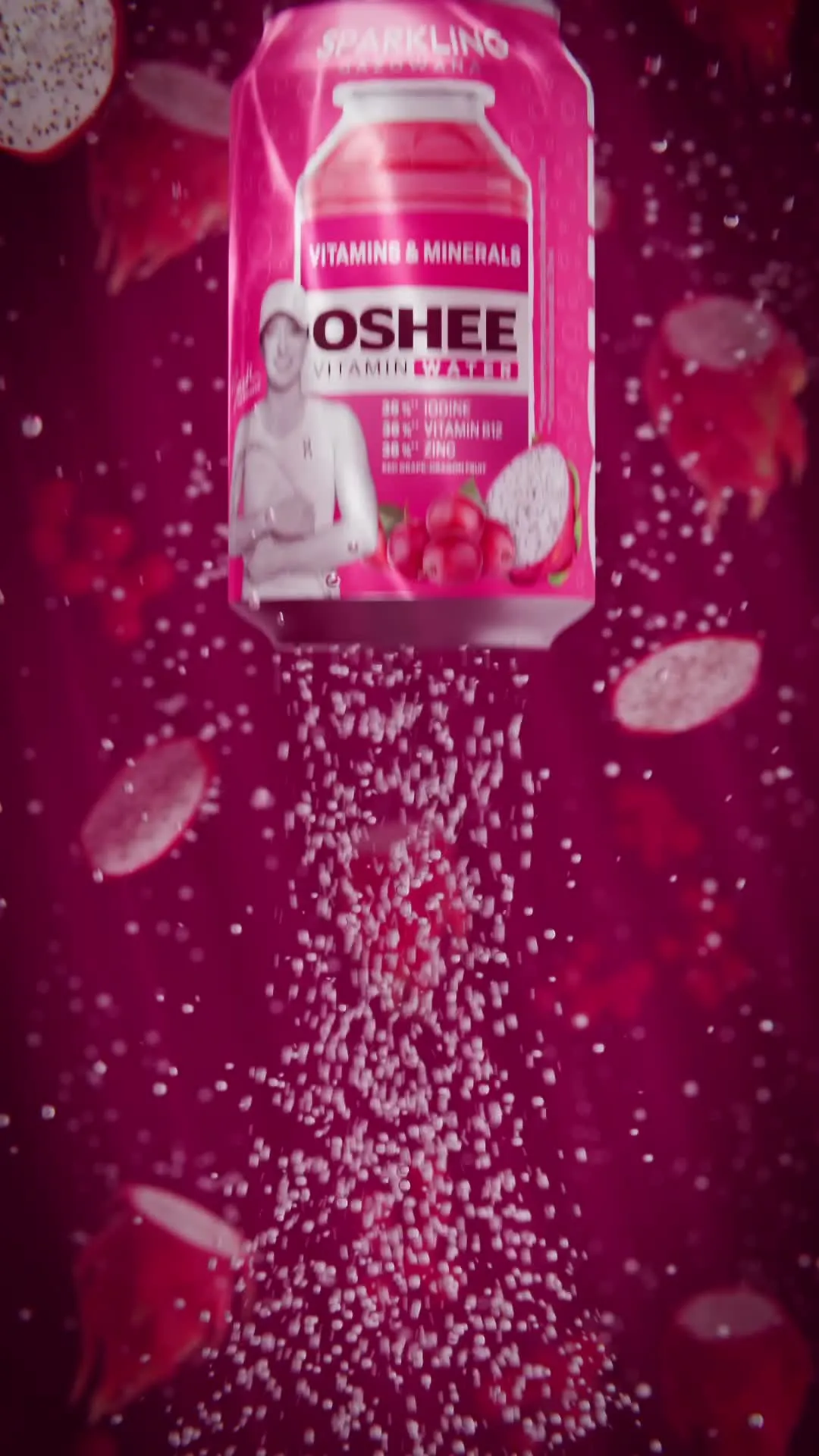 Vertical frame from the OSHEE Sparkling Water animation, the can amid pink carbonation bubbles